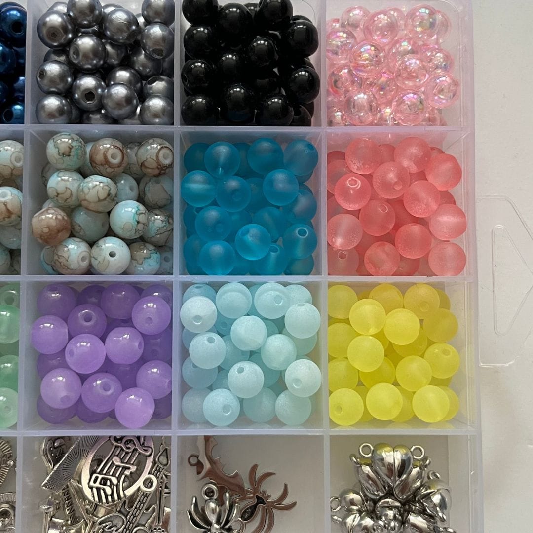 Beading kit trays of beads in pink, blue, green and yellow with charms - Beads by Nia