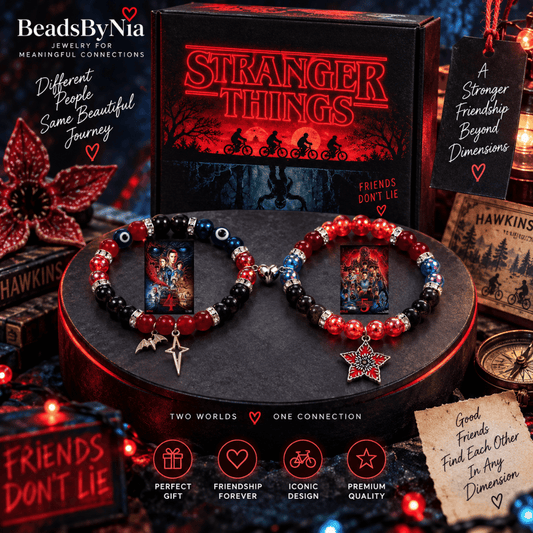 Stranger Things bracelets on a dark stand with star and bat charms - Beads by Nia