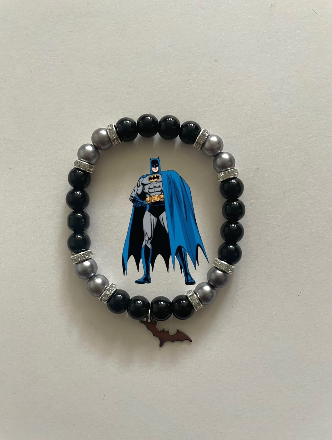 Batman bracelet in black, grey and white beads with character art and bat charm - Beads by Nia