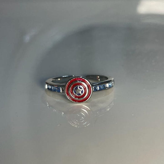Captain America shield ring angled view showing blue crystal band - Beads by Nia