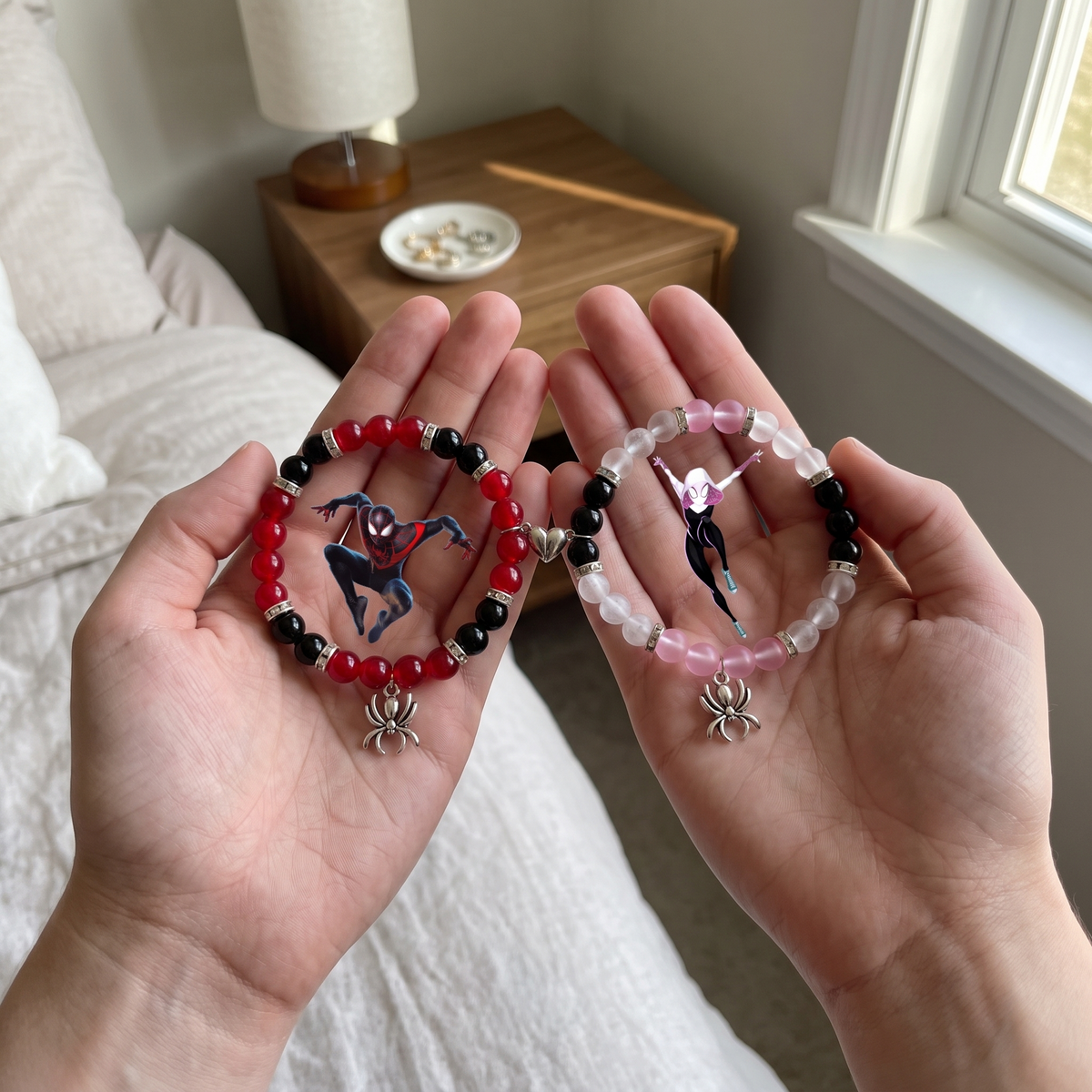 Hands holding Miles Morales and Spider-Gwen matching bracelets - Beads by Nia