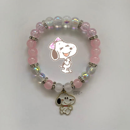 Pink Snoopy bracelet with iridescent beads and a Snoopy charm - Beads by Nia