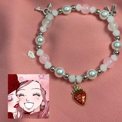 Hachi anime bracelet in white and pink pearl beads with strawberry charm - Beads by Nia