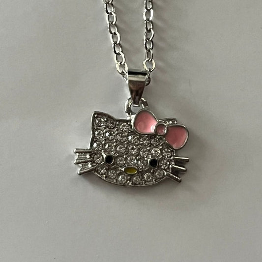 Silver crystal Hello Kitty pendant necklace with a pink bow - Beads by Nia