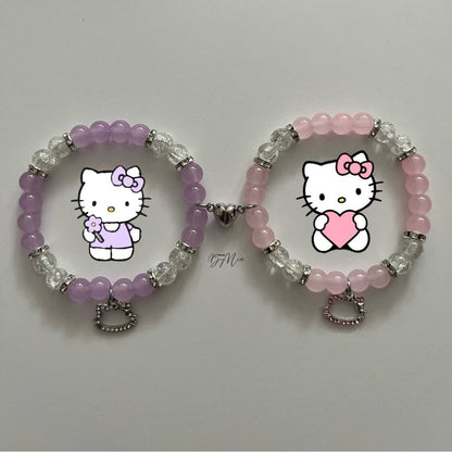 Purple and pink Hello Kitty bracelets with character art and silver charms - Beads by Nia