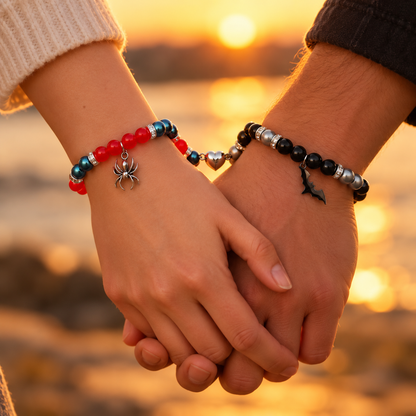 Holding hands at sunset wearing Batman and Spiderman couples bracelets - Beads by Nia