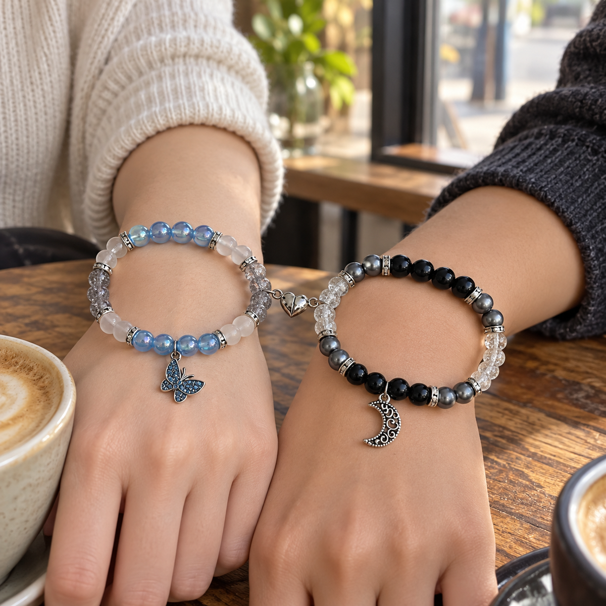 Couple wearing Emily and Victor matching bracelets at a cafe - Beads by Nia