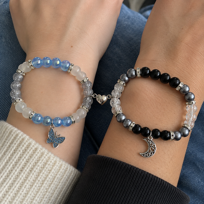 Two wrists wearing blue and black Corpse Bride matching bracelets - Beads by Nia