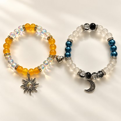 Yellow sun and blue moon beaded bracelets side by side with silver charms - Beads by Nia