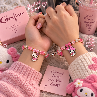 Two friends linking wrists in pink My Melody and Hello Kitty bracelets - Beads by Nia