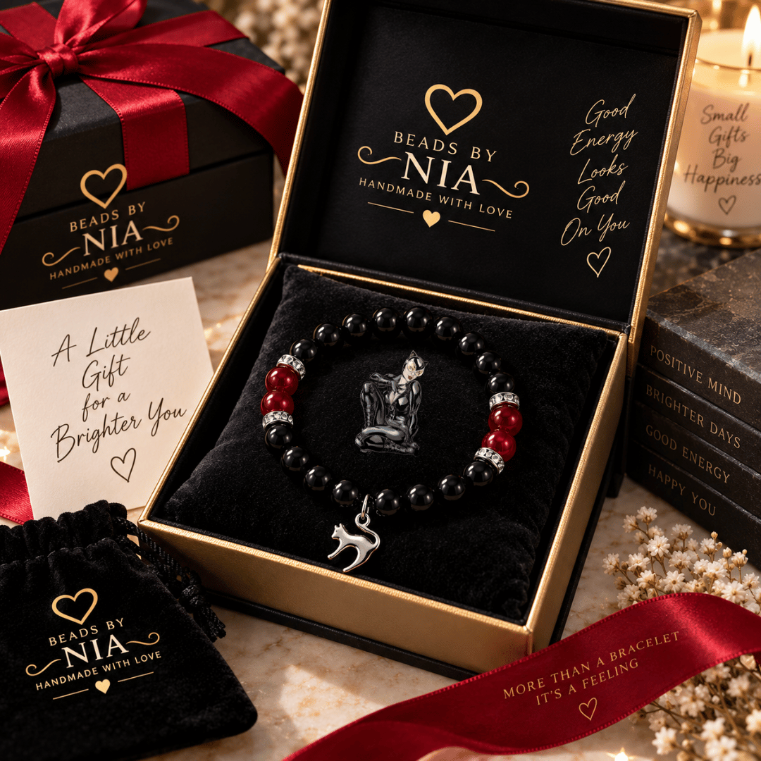 Catwoman bracelet in black and red beads with a cat charm in a black gift box