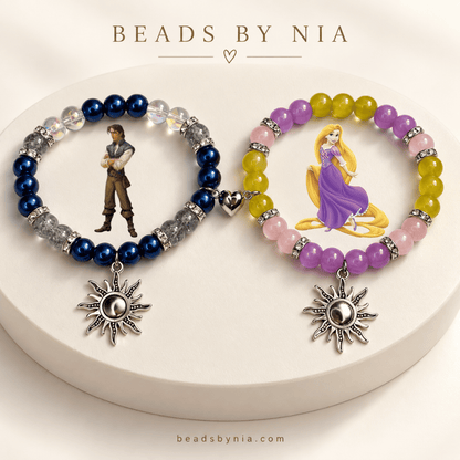 Navy Flynn and lilac Rapunzel bracelets with character art and silver sun charms