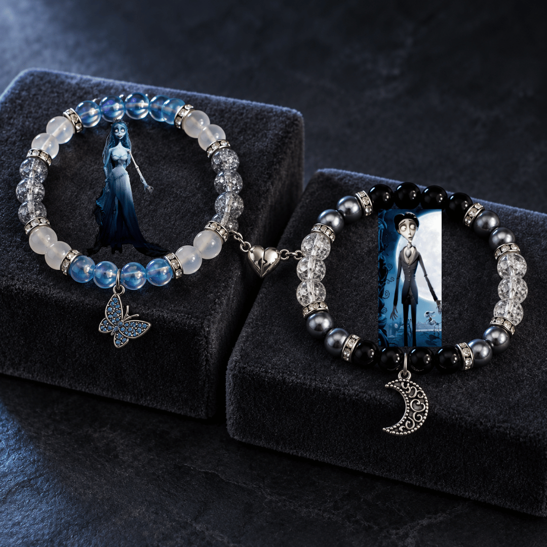 Emily and Victor bracelets on dark podiums with butterfly and moon charms - Beads by Nia