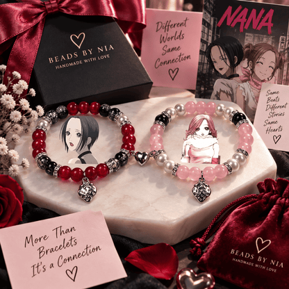 Nana and Hachi bracelets on a pink stand with velvet pouch and gift cards