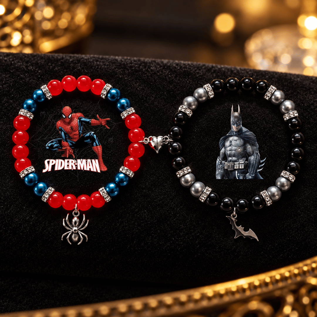 Spiderman and Batman beaded bracelets on black velvet with spider and bat charms