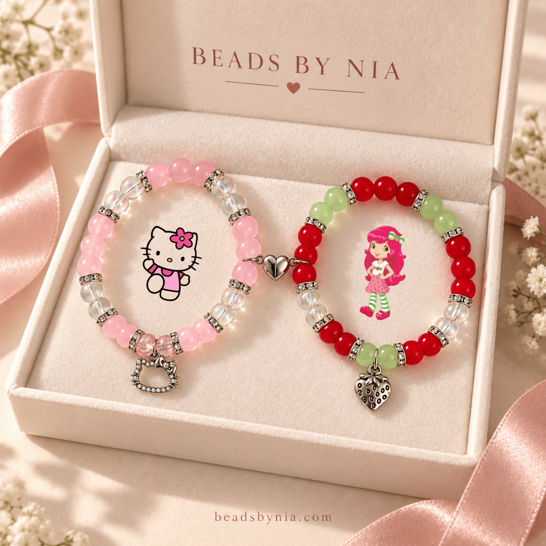 Hello Kitty and Strawberry Shortcake bracelets in a cream gift box with ribbon - Beads by Nia