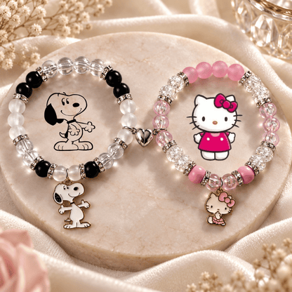 Snoopy and Hello Kitty bracelets on pink satin with character charms - Beads by Nia