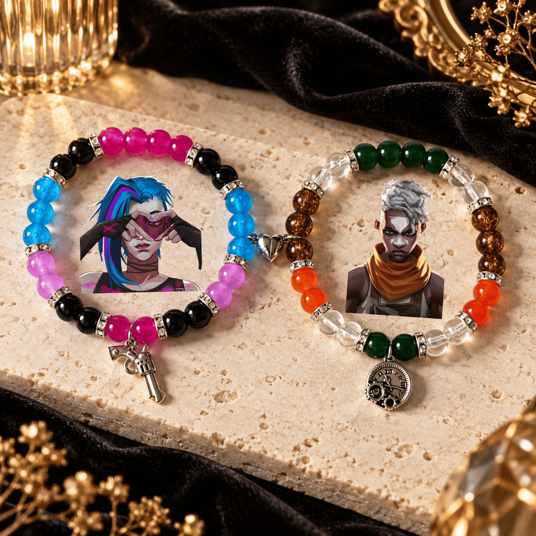 Jinx and Ekko beaded bracelets on cream stone with gun and clock charms - Beads by Nia
