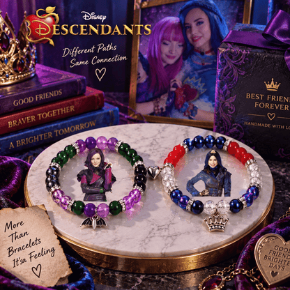 Mal and Evie Descendants bracelets on a gold tray with crown charms - Beads by Nia