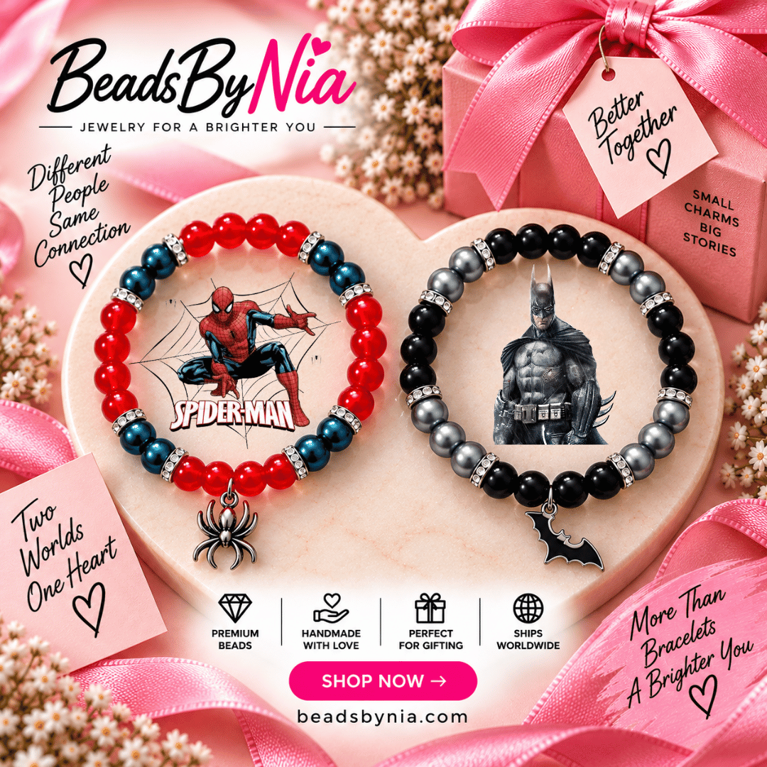 Batman and Spiderman bracelet pair on a pink stand with spider and bat charms