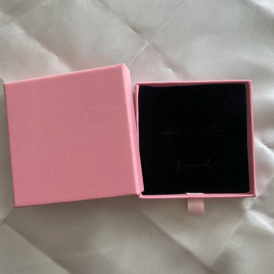 Pink sliding gift box shown open from above with black velvet jewellery insert - Beads by Nia