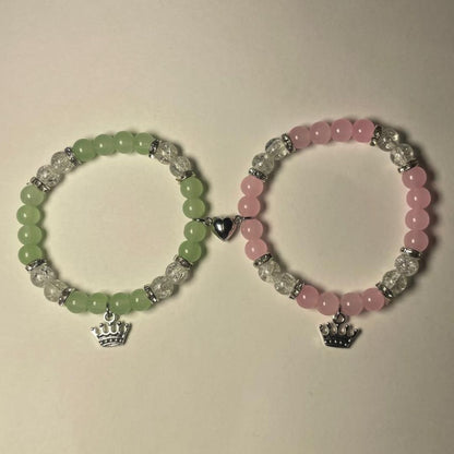 Green and pink Princess and the Frog bracelets joined by a magnetic heart clasp - Beads by Nia