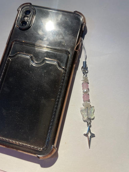 Beaded dream catcher phone charm hanging from a black phone case - Beads by Nia